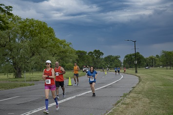 many runners running on the track